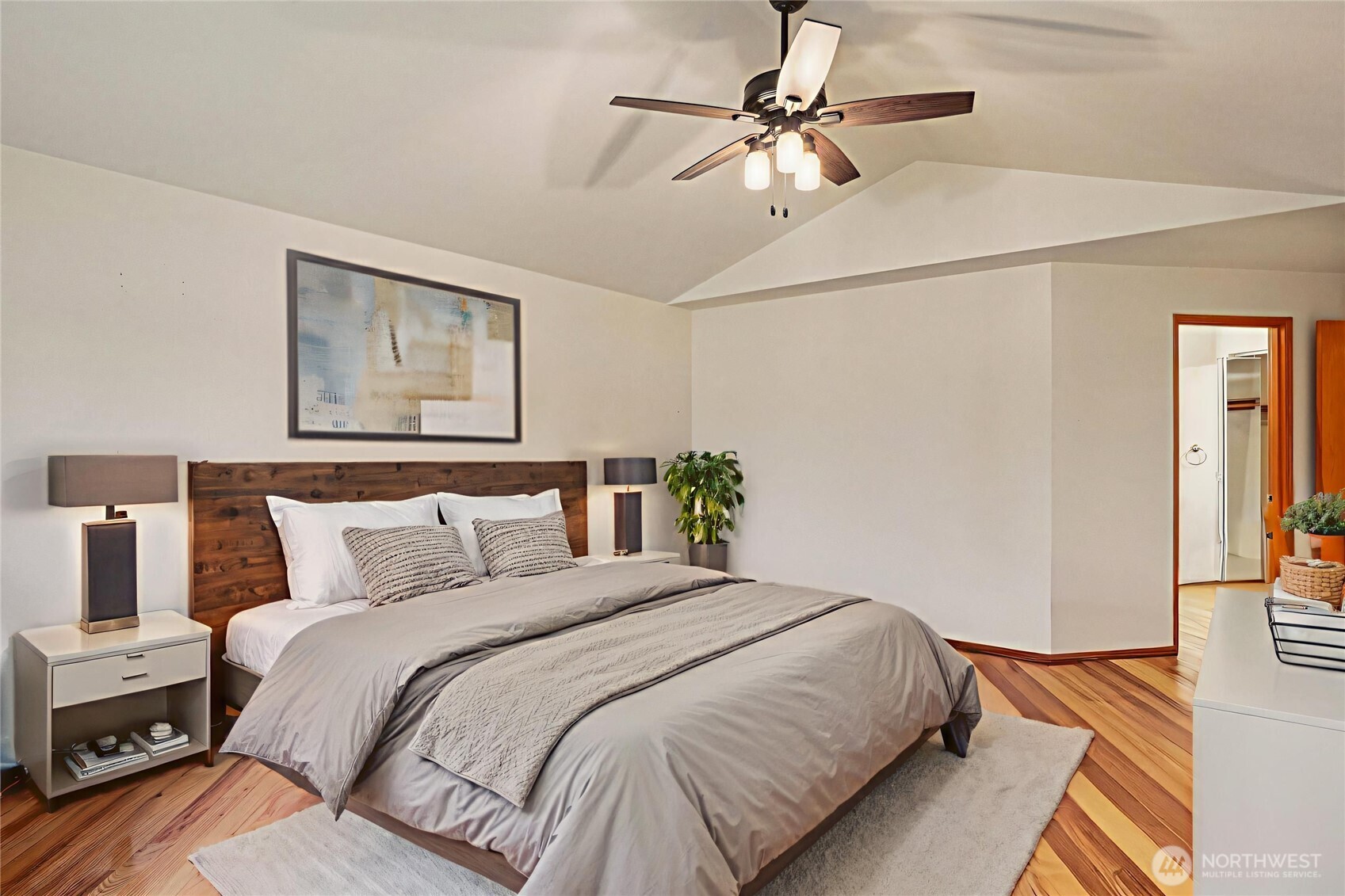 35031 8th Place Southwest Federal Way, WA 98023 - Photo 20 of 36 a bedroom with a bed and a chandelier