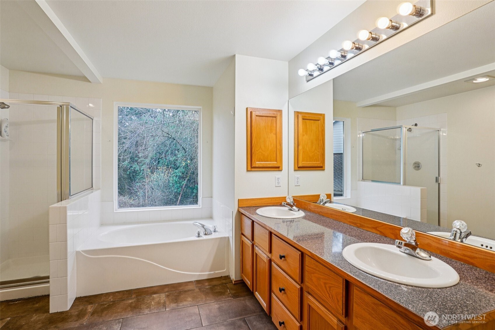 35031 8th Place Southwest Federal Way, WA 98023 - Photo 22 of 36 a bathroom with a granite countertop tub sink and mirror