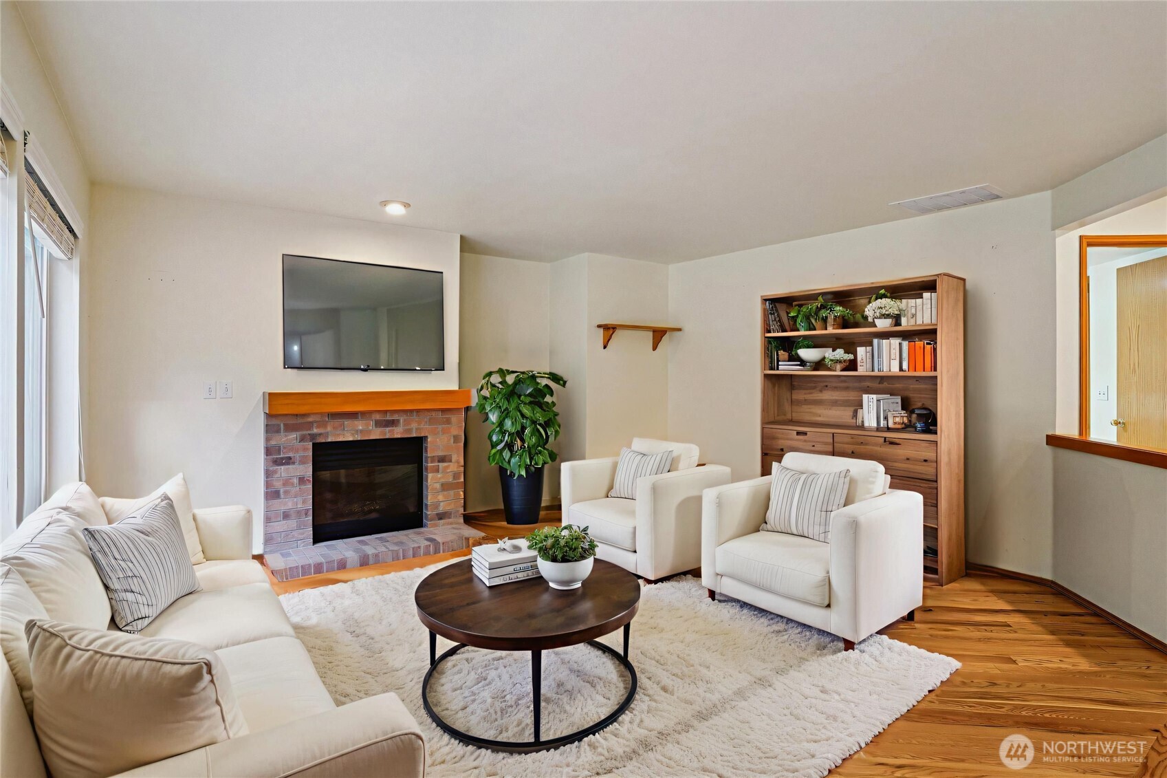 35031 8th Place Southwest Federal Way, WA 98023 - Photo 10 of 36 a living room with furniture a rug and a fireplace