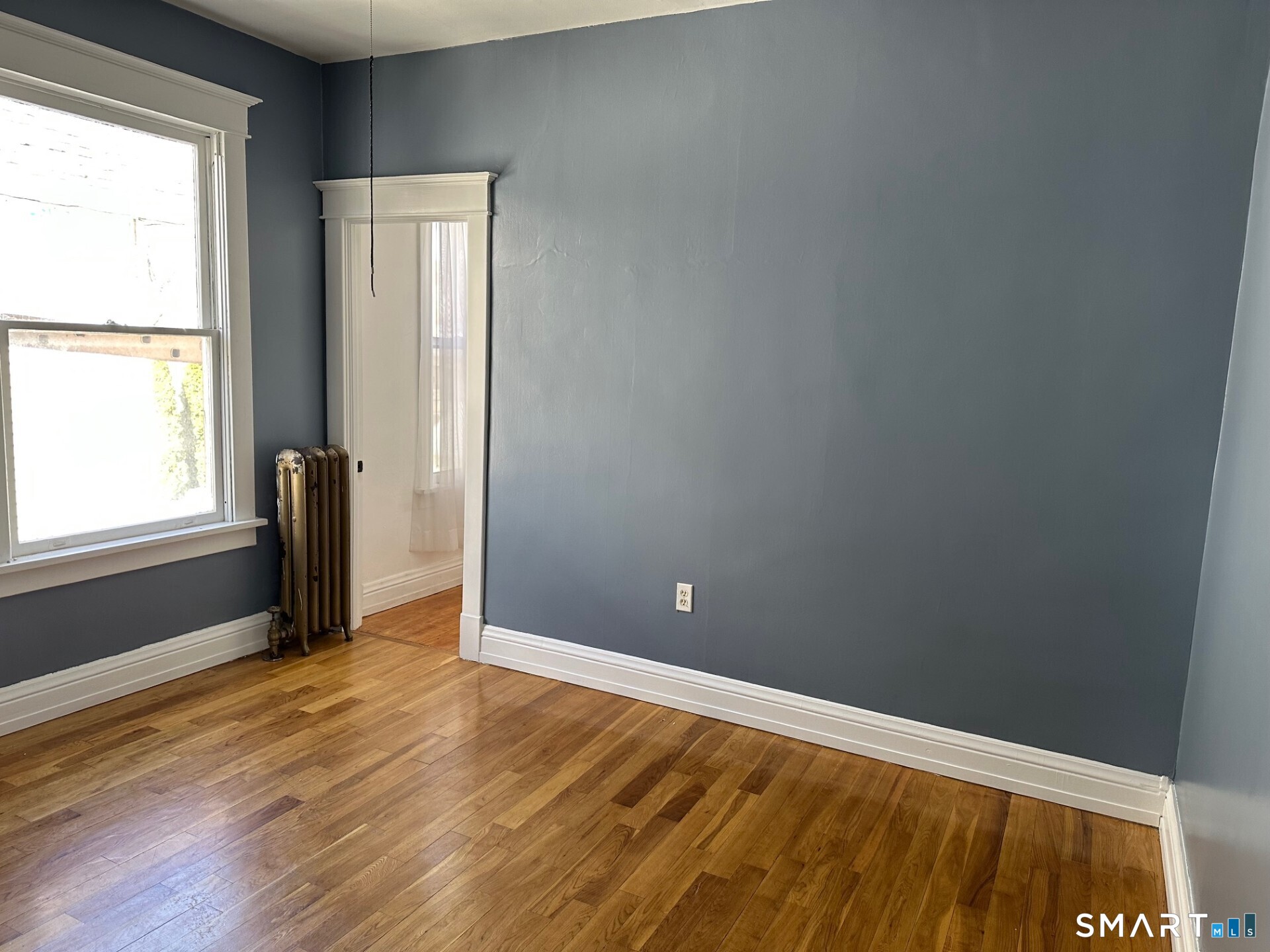 20 Taylor Street Torrington, CT 06790 - Photo 17 of 19 a view of an empty room and window