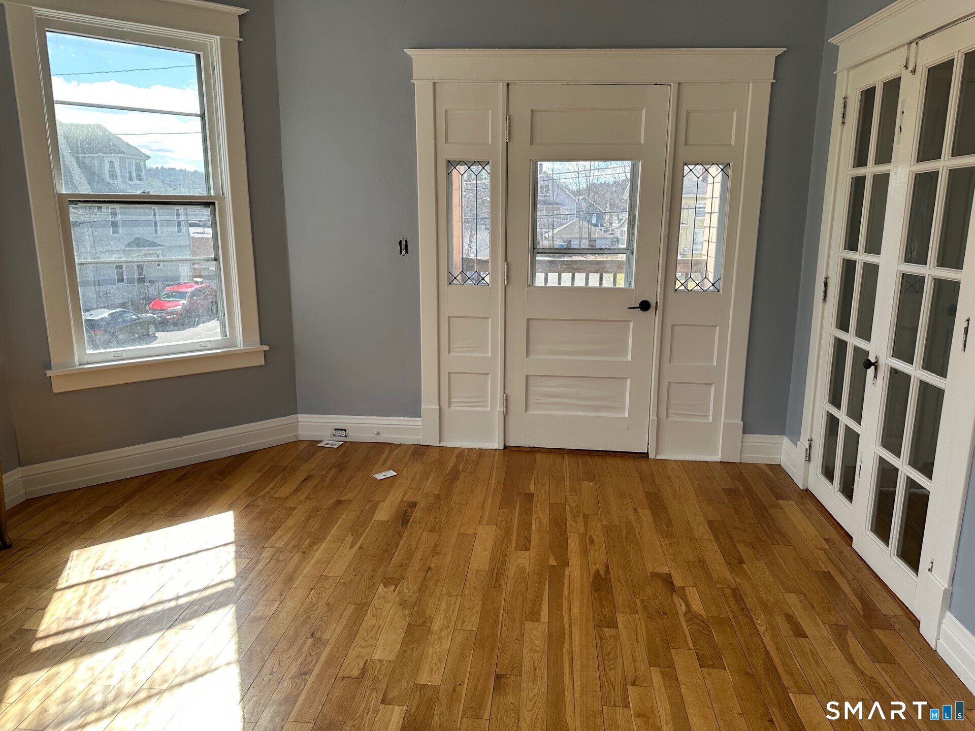 20 Taylor Street Torrington, CT 06790 - Photo 7 of 19 a view of an empty room and window