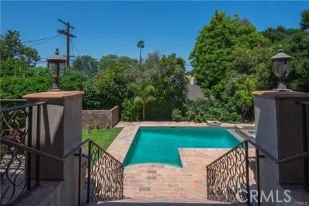 a view of a backyard with furniture