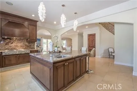 a kitchen with a stove and a sink