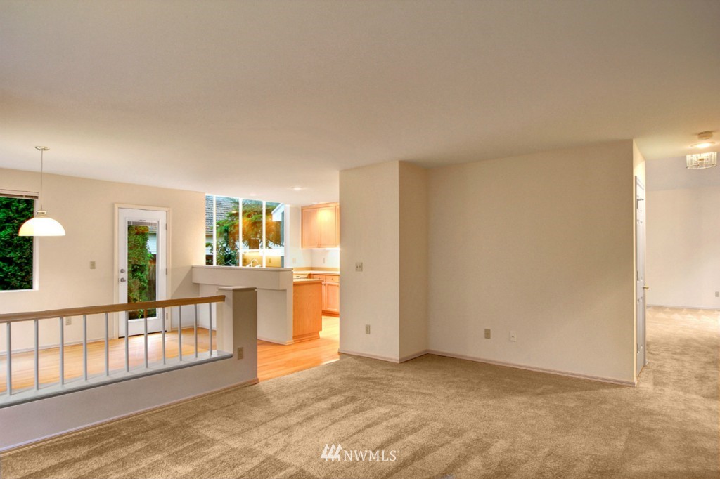 19640 88th Place Northeast Bothell, WA 98011 - Photo 11 of 15 a view of a kitchen with a sink and a living room