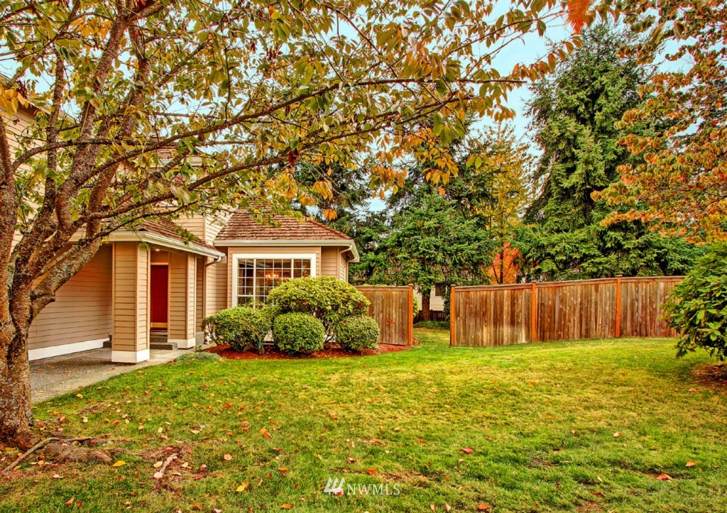 19640 88th Place Northeast Bothell, WA 98011 - Photo 14 of 15 a front view of a house with garden