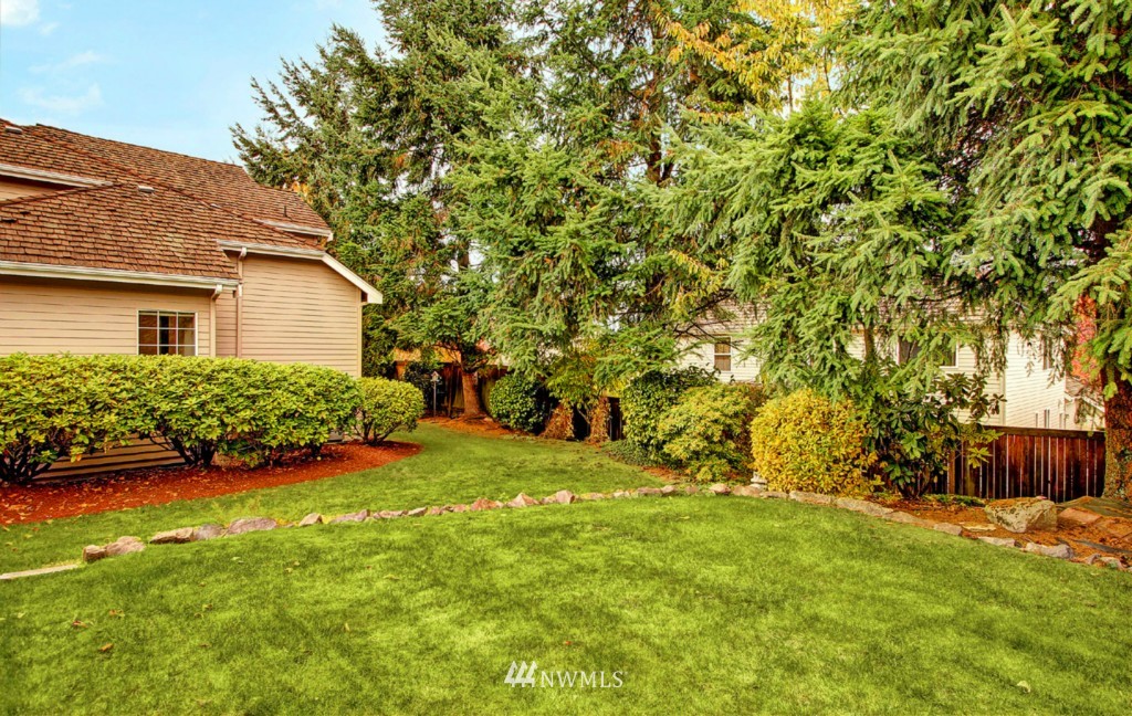 19640 88th Place Northeast Bothell, WA 98011 - Photo 15 of 15 a front view of a house with garden