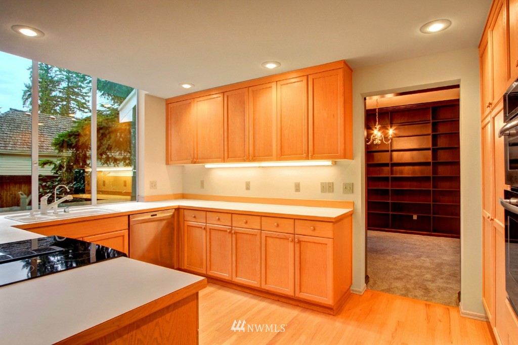 19640 88th Place Northeast Bothell, WA 98011 - Photo 7 of 15 a kitchen that has a sink and a stove in it