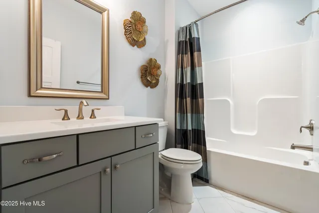 $610,000 | 909 Oyster Pointe Drive, Sunset Beach, NC 28468