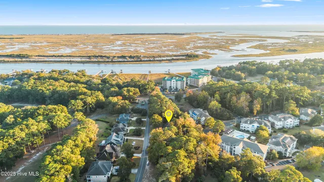 $610,000 | 909 Oyster Pointe Drive, Sunset Beach, NC 28468