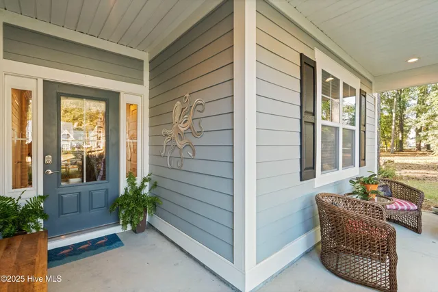 $610,000 | 909 Oyster Pointe Drive, Sunset Beach, NC 28468