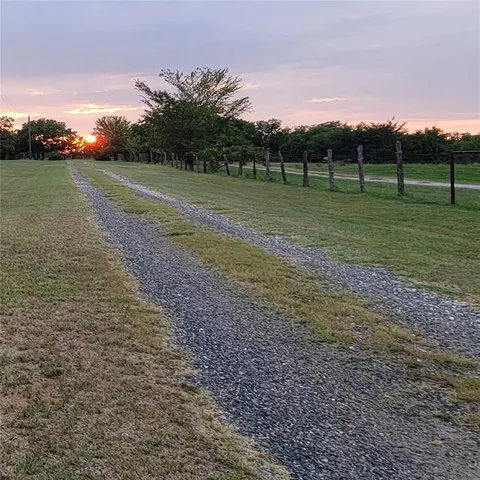 a view of yard with trees