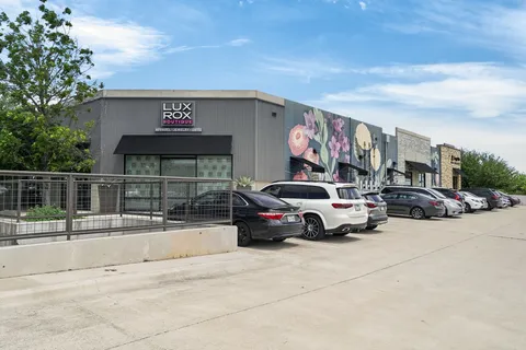 a view of a building with a street