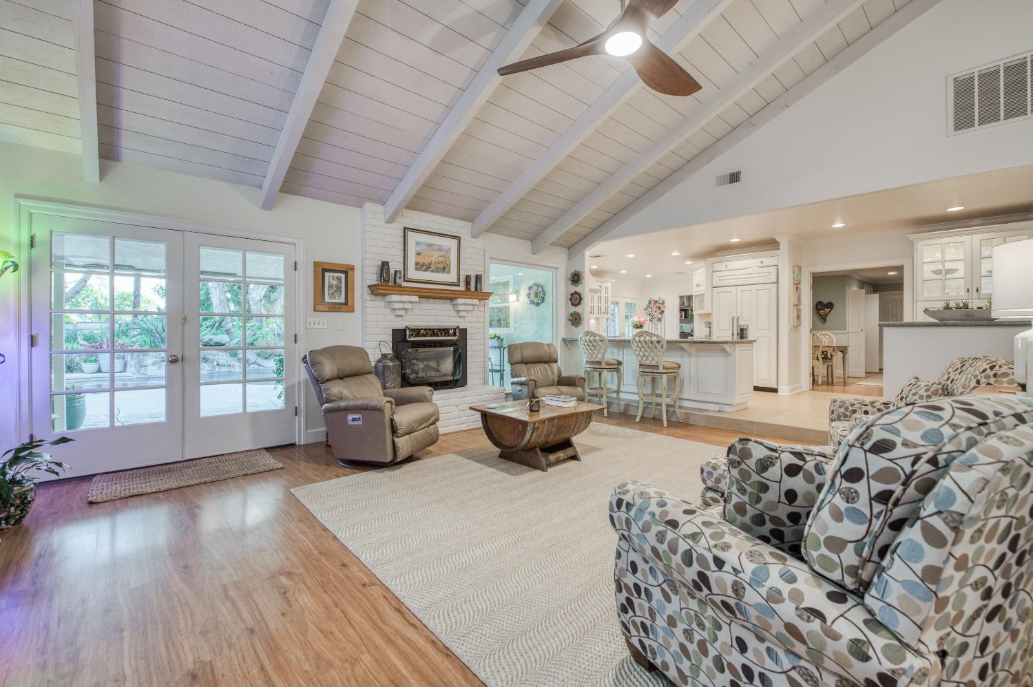 2988 Enterprise Avenue Clovis, CA 93619 - Photo 15 of 99 a living room with furniture and a fireplace