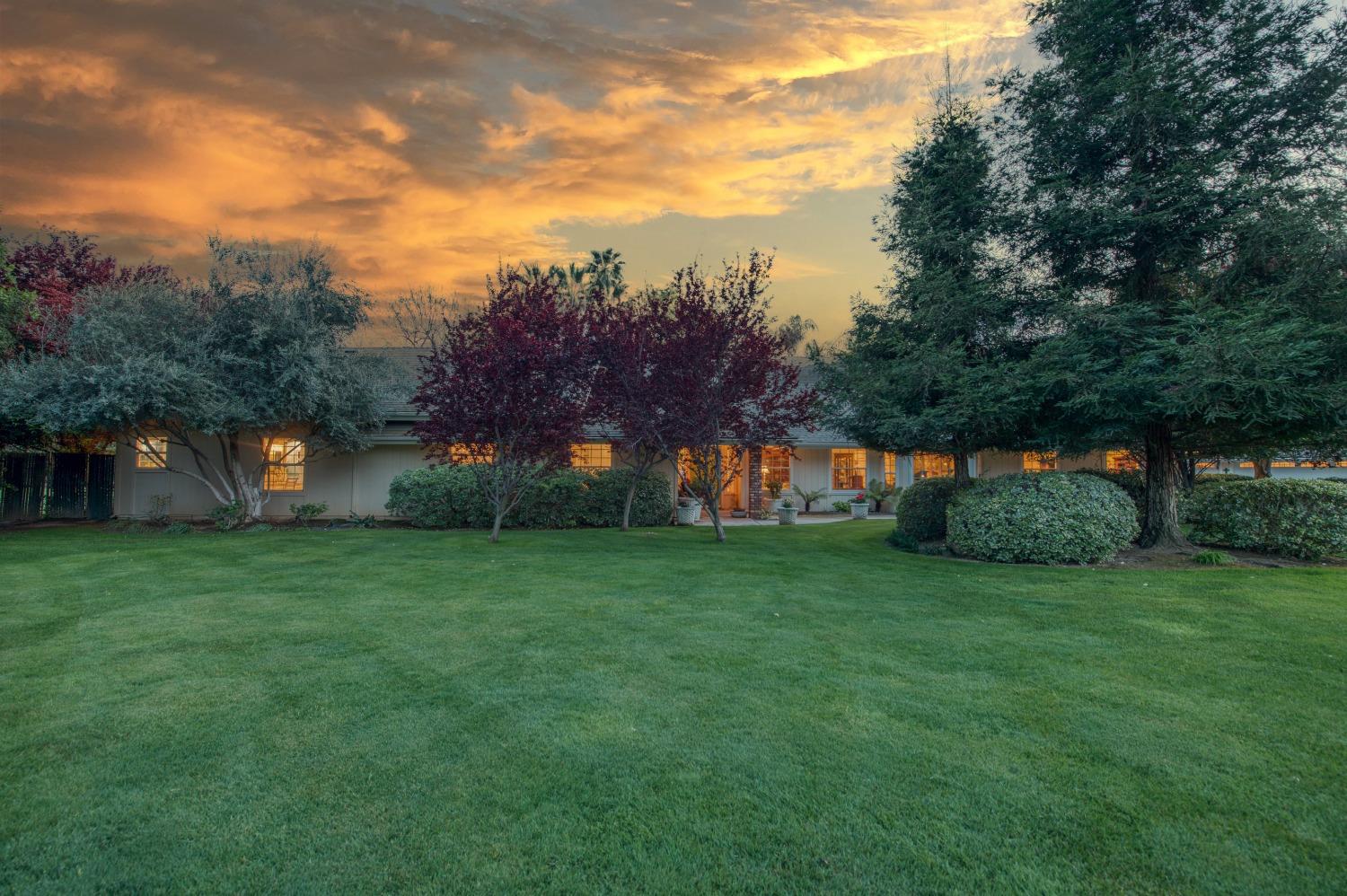 2988 Enterprise Avenue Clovis, CA 93619 - Photo 25 of 99 a view of a trees and barn in the middle of a yard