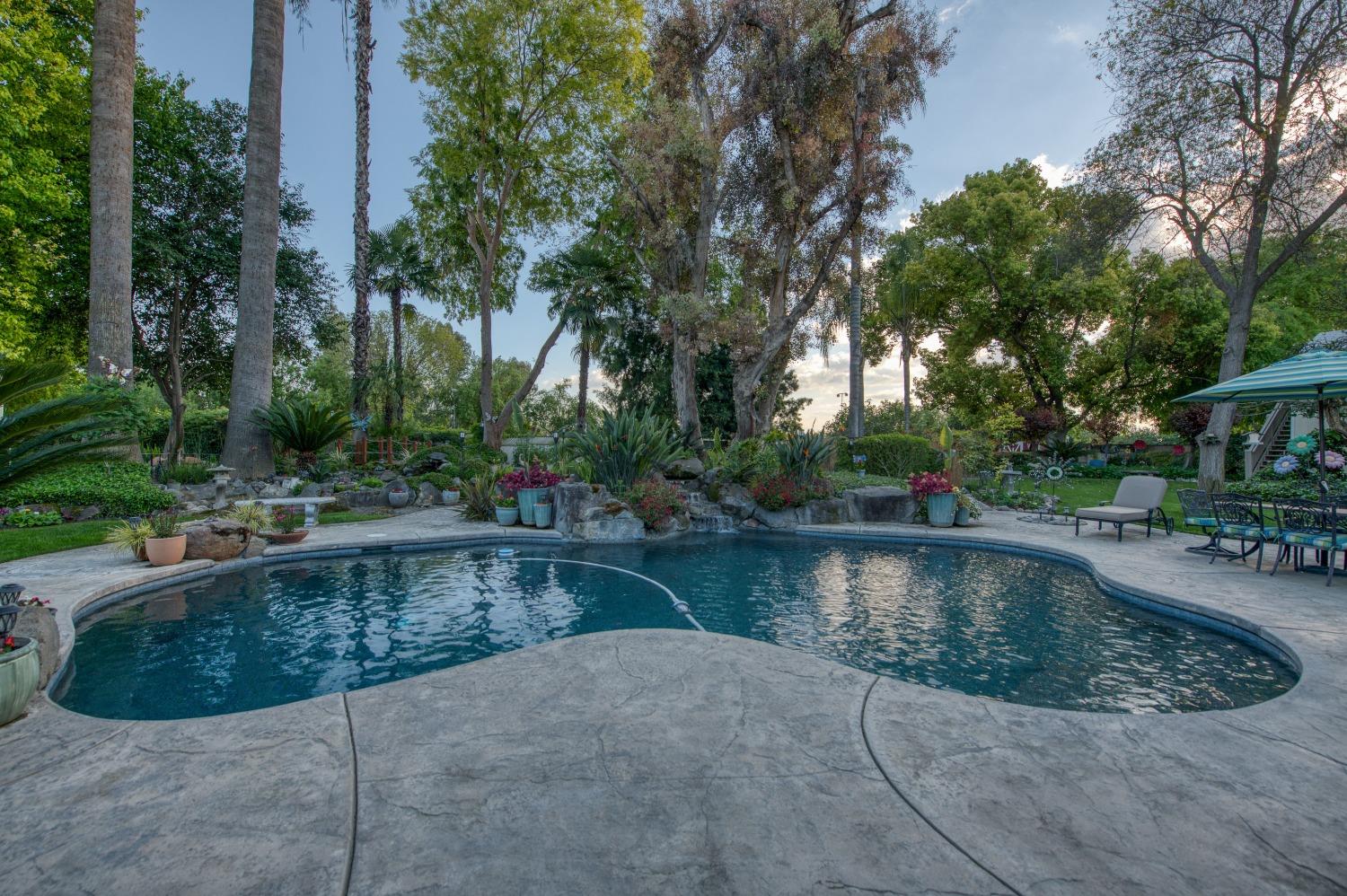 2988 Enterprise Avenue Clovis, CA 93619 - Photo 56 of 99 a view of a swimming pool with a patio