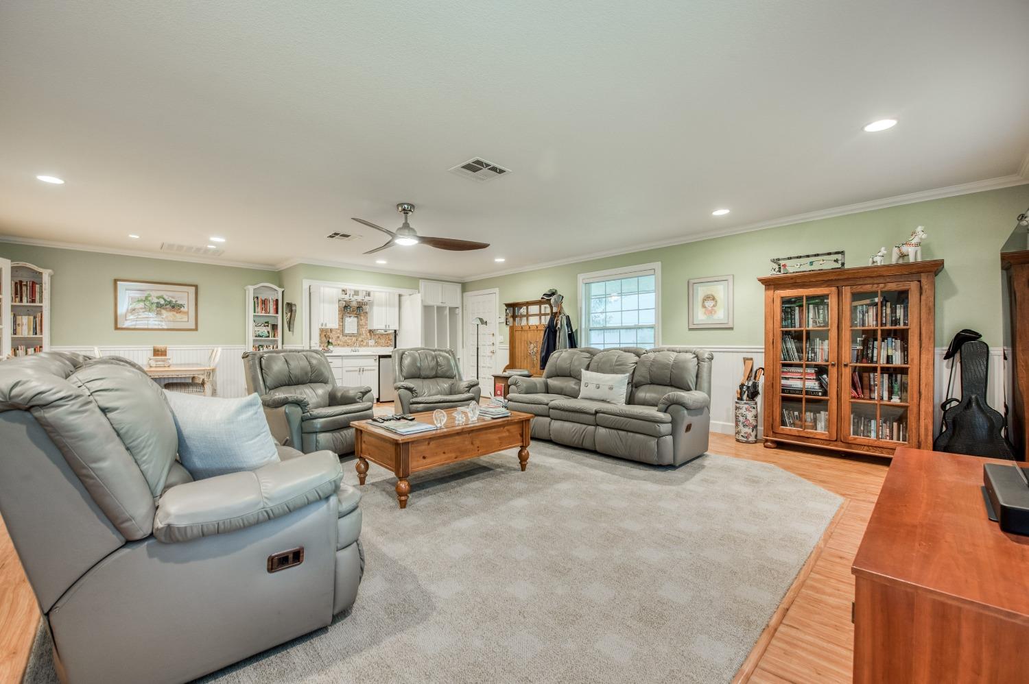 2988 Enterprise Avenue Clovis, CA 93619 - Photo 73 of 99 a living room with furniture and wooden floor