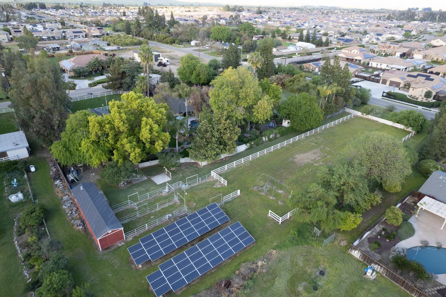 2988 Enterprise Avenue Clovis, CA 93619 - Photo 9 of 99 an aerial view of a house with a yard