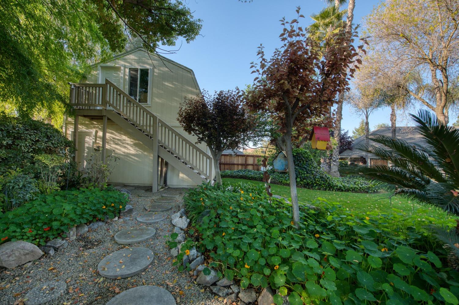 2988 Enterprise Avenue Clovis, CA 93619 - Photo 91 of 99 a view of a house with a yard
