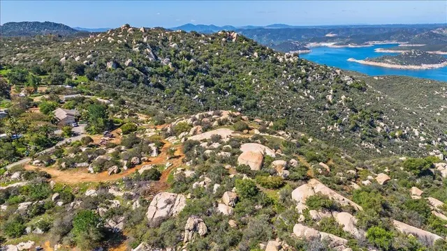 an aerial view of residential house and green space