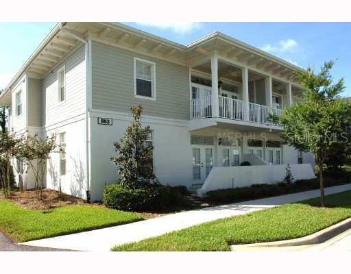 863 Spring Park Loop, Unit 202 Celebration, FL 34747 - Photo 1 of 1 a view of a house with a yard