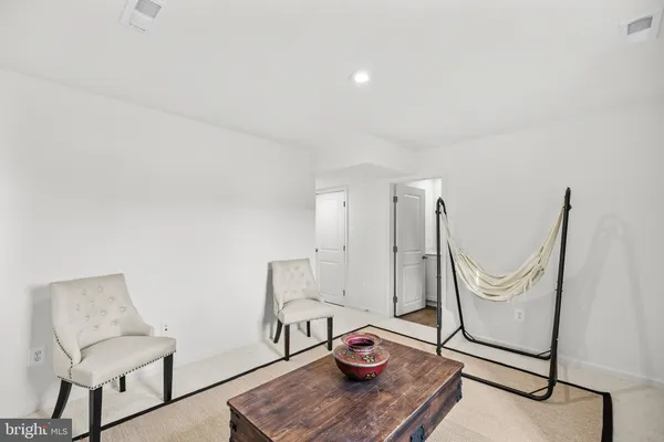 a view of a livingroom with furniture