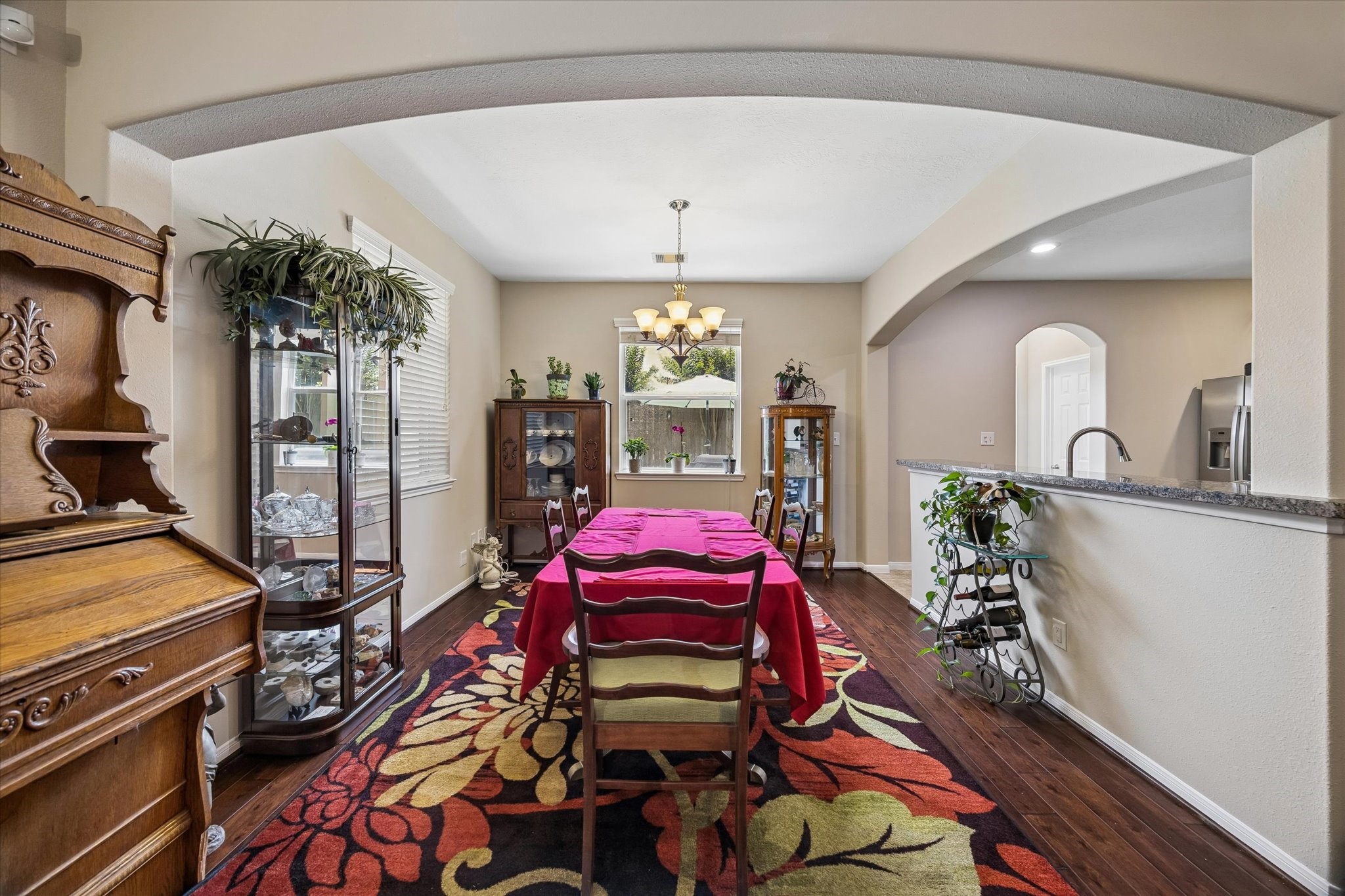 8433 Sunset Loch Drive Spring, TX 77379 - Photo 9 of 25 a living room with furniture and a chandelier
