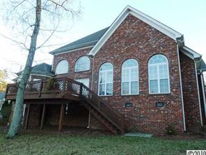 908 Ashford Way Fort Mill, SC 29708 - Photo 2 of 16 a front view of a house with garden
