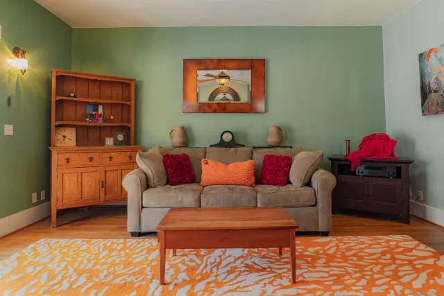 a bedroom with furniture and a window