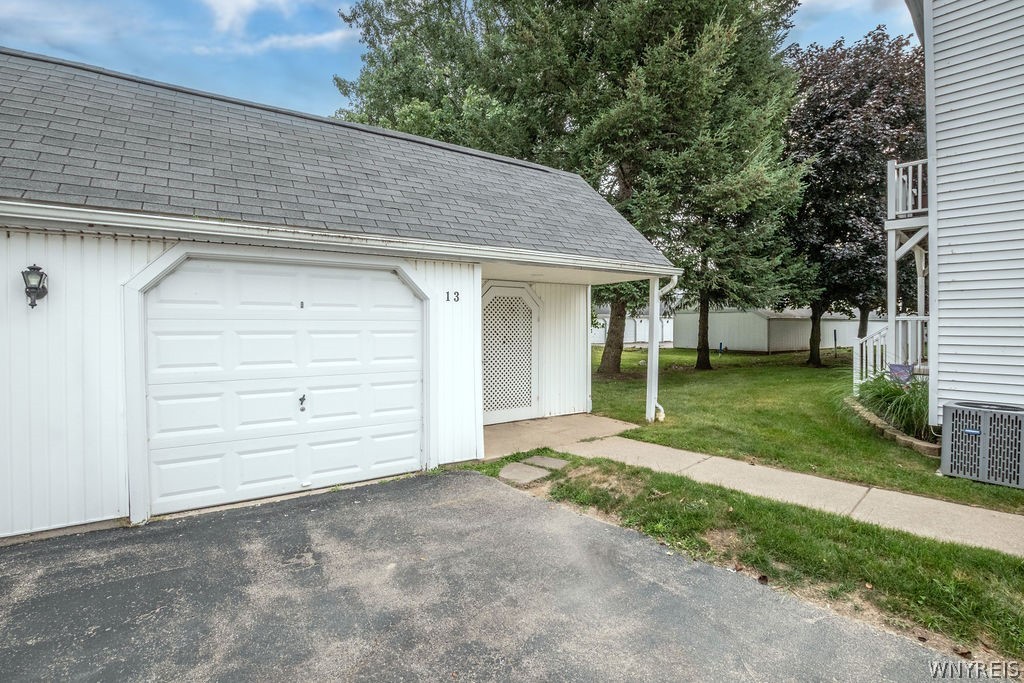 4755 Chestnut Ridge Road, Unit 9 Amherst, NY 14228 - Photo 6 of 46 Location of garage and trash room in comparison to your rear deck. VERY CLOSE!!