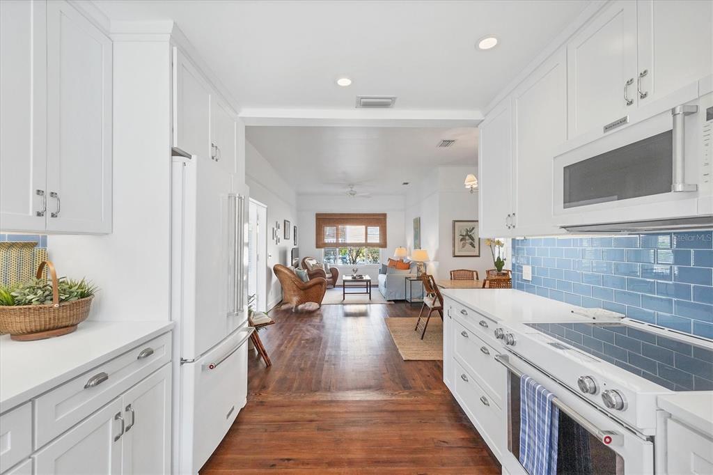 380 Tarpon Avenue Boca Grande, FL 33921 - Photo 13 of 38 a large kitchen with cabinets