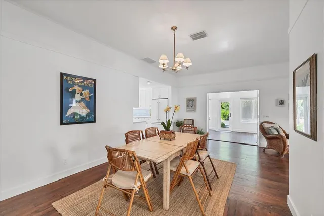 a bathroom with a sink a mirror and shower