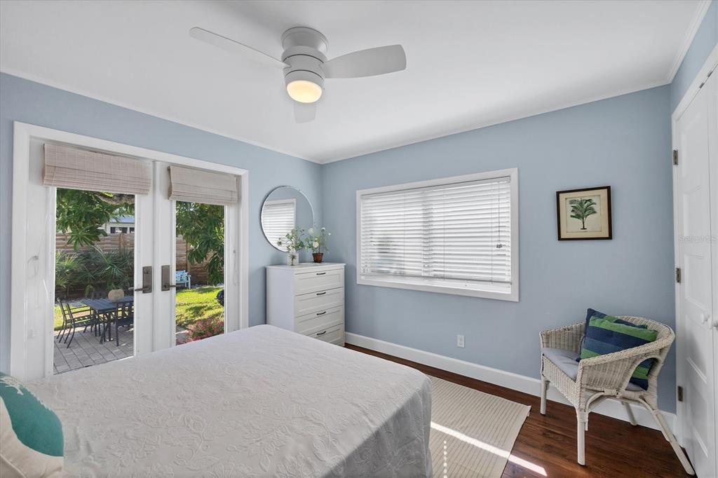 380 Tarpon Avenue Boca Grande, FL 33921 - Photo 23 of 38 a bedroom with a bed and a table