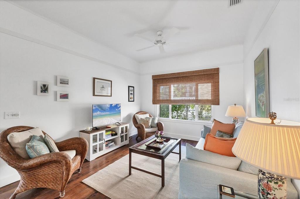 380 Tarpon Avenue Boca Grande, FL 33921 - Photo 9 of 38 a living room with furniture and a window