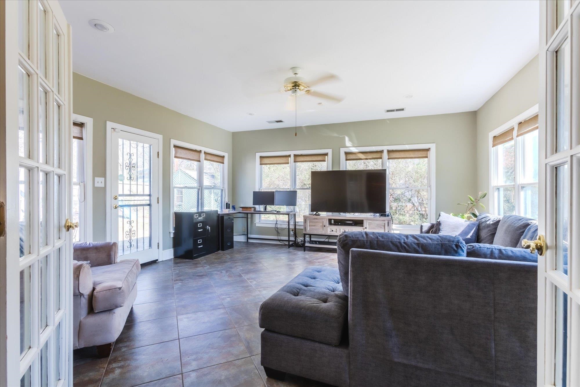 1490 Hayne Road Memphis, TN 38119 - Photo 20 of 33 a living room with furniture and a flat screen tv