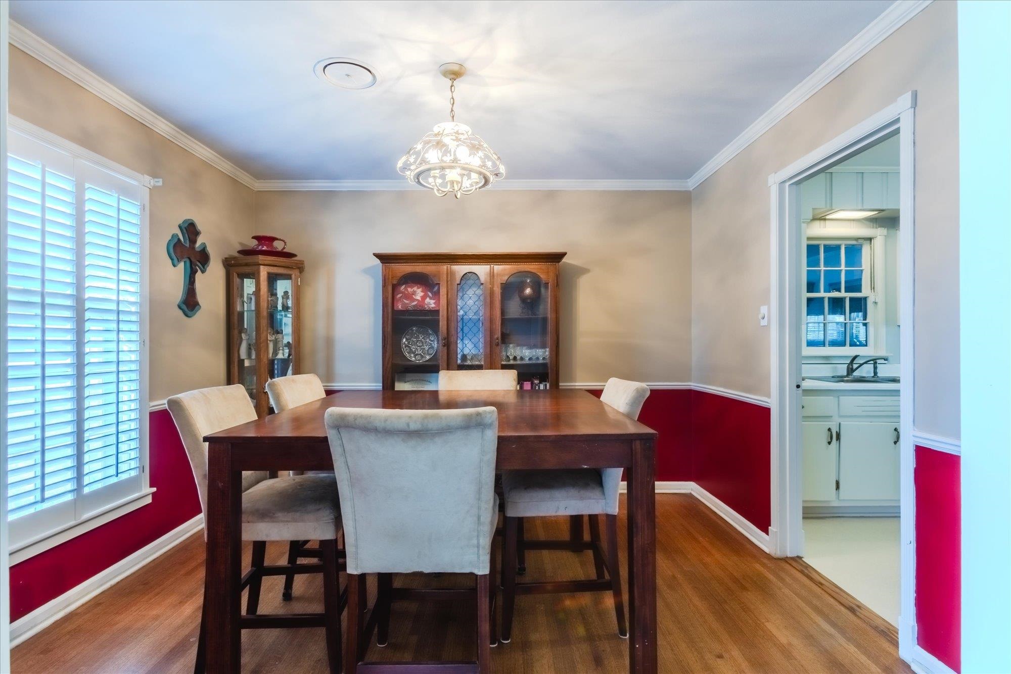 1490 Hayne Road Memphis, TN 38119 - Photo 8 of 33 a view of a dining room with furniture a chandelier and wooden floor