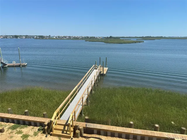 a view of a balcony with lake view