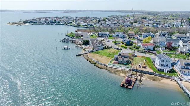 an aerial view of a house with outdoor space