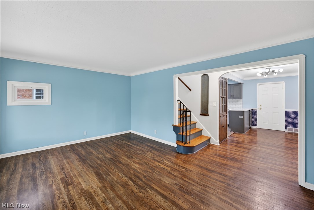 4186 Lambert Road South Euclid, OH 44121 - Photo 3 of 36 The Living Room with hardwood floor and cove ceiling
