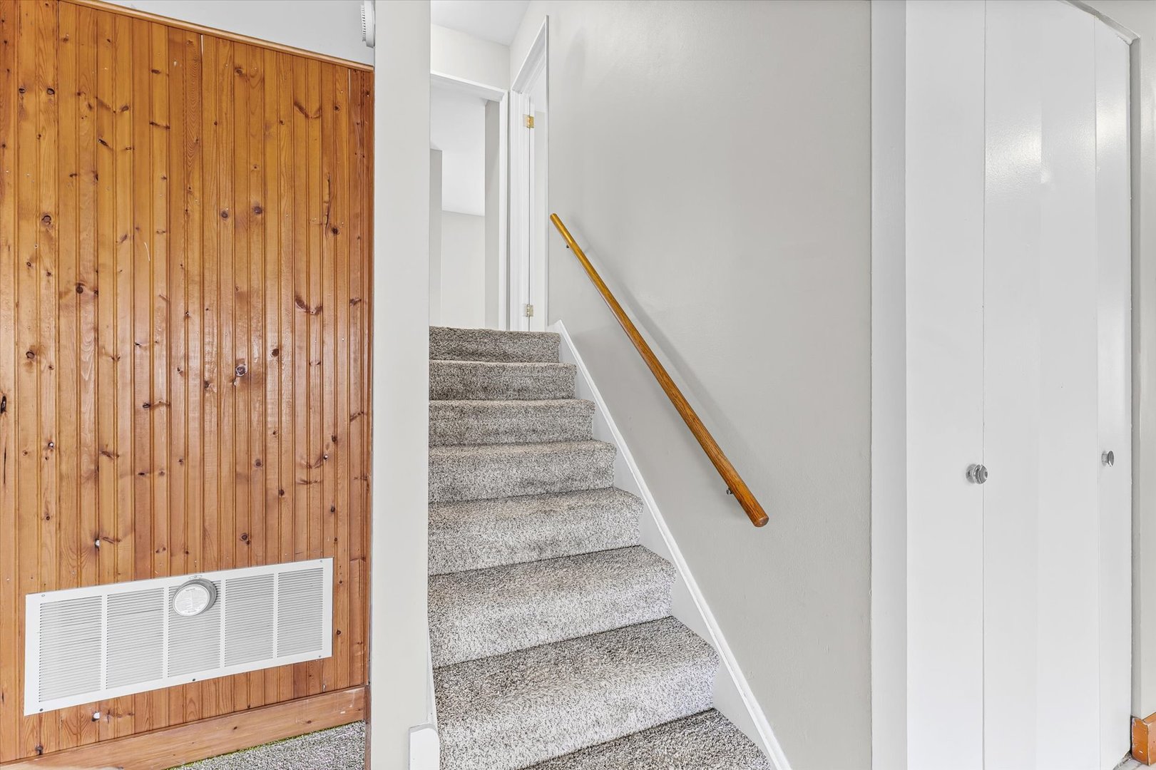 1612 Golfview Road Rantoul, IL 61866 - Photo 13 of 28 a view of staircase with railing and white walls