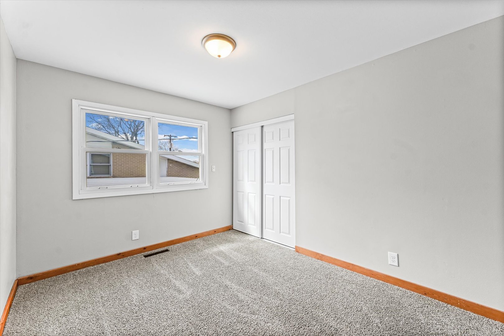 1612 Golfview Road Rantoul, IL 61866 - Photo 14 of 28 a view of an empty room with a window