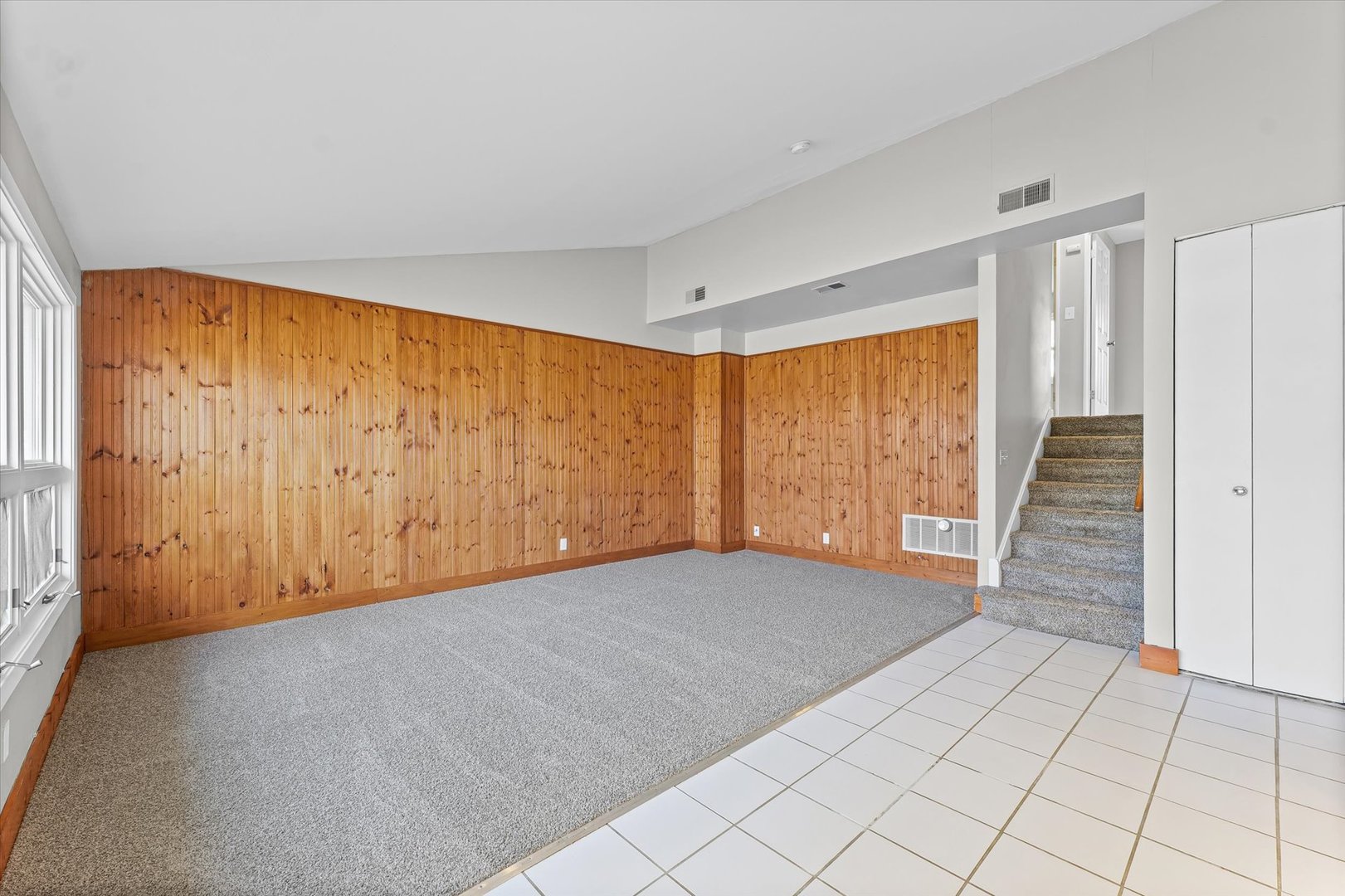 1612 Golfview Road Rantoul, IL 61866 - Photo 5 of 28 a view of an empty room with a window