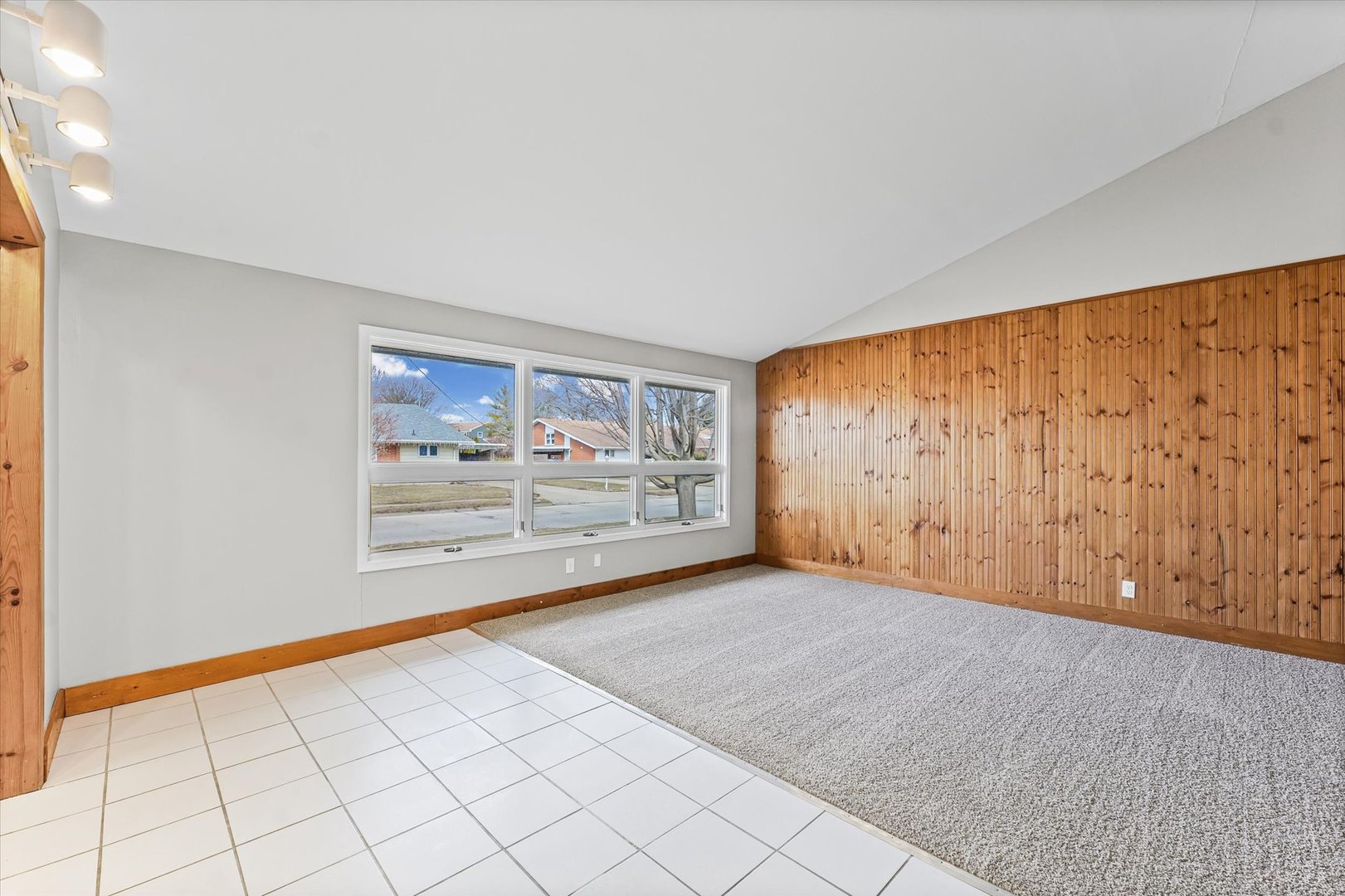 1612 Golfview Road Rantoul, IL 61866 - Photo 8 of 28 a view of an empty room with a window