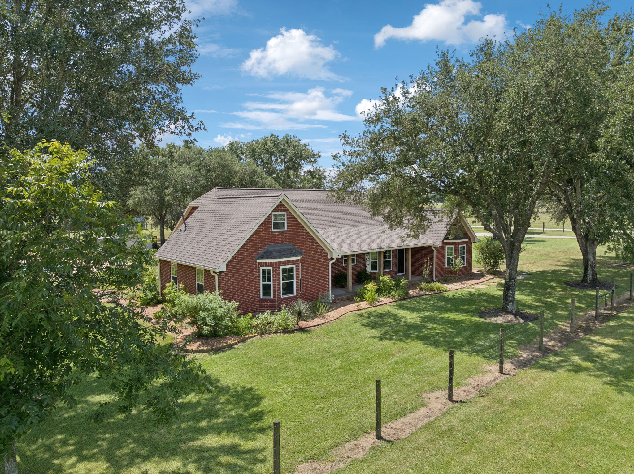 a house view with a garden space