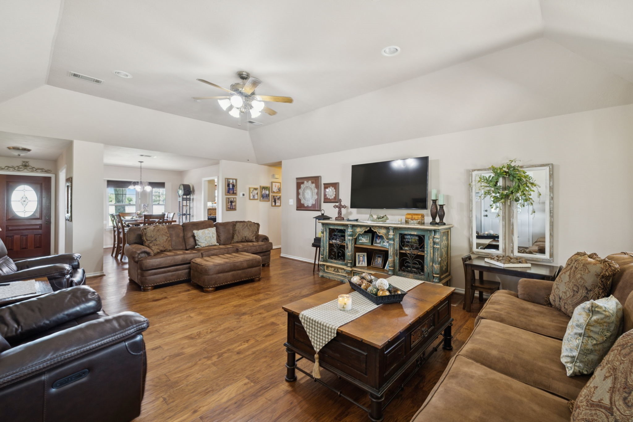 31229 Rochen Road Waller, TX 77484 - Photo 18 of 50 a living room with furniture and a flat screen tv