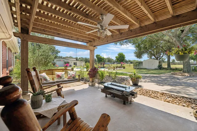 a view of a swimming pool with a patio