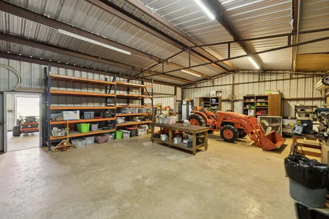 a view of a garage with parked cars