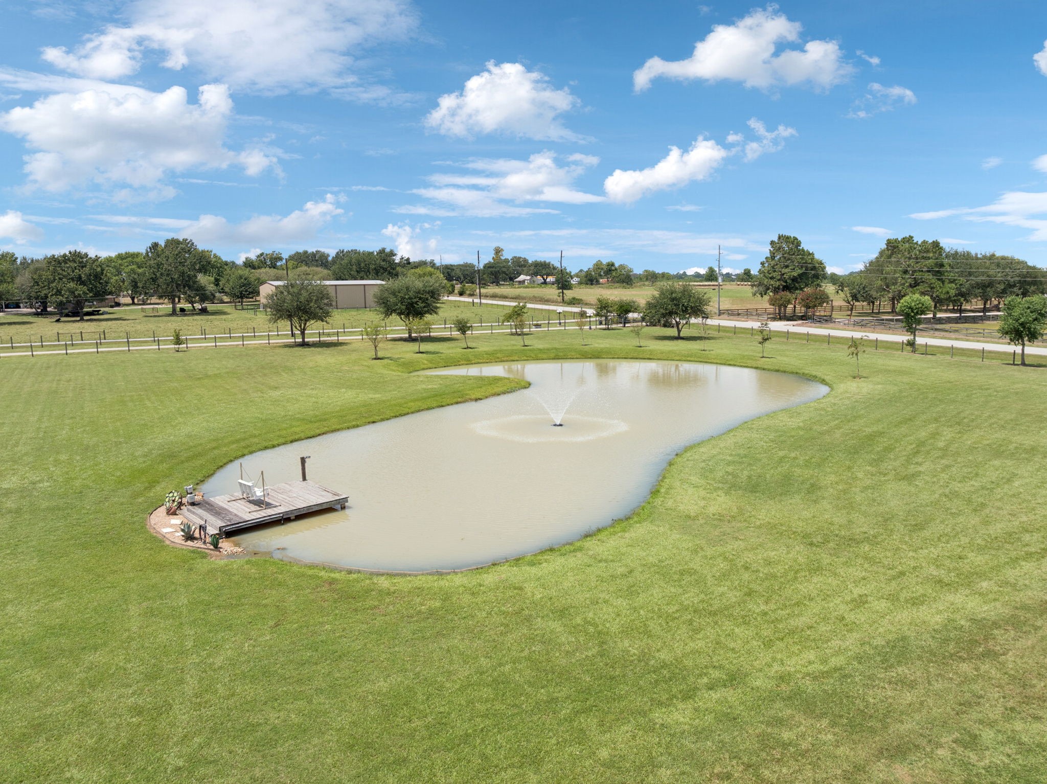 31229 Rochen Road Waller, TX 77484 - Photo 6 of 50 a view of a lake with a city