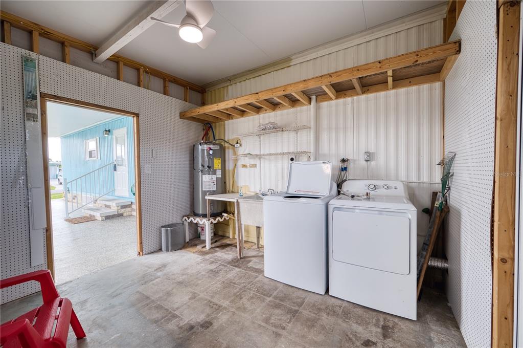 6269 Parakeet Road Englewood, FL 34224 - Photo 28 of 28 a utility room with dryer and washer
