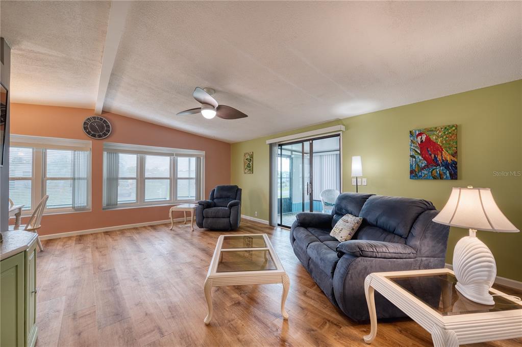 6269 Parakeet Road Englewood, FL 34224 - Photo 5 of 28 a living room with furniture and a large window