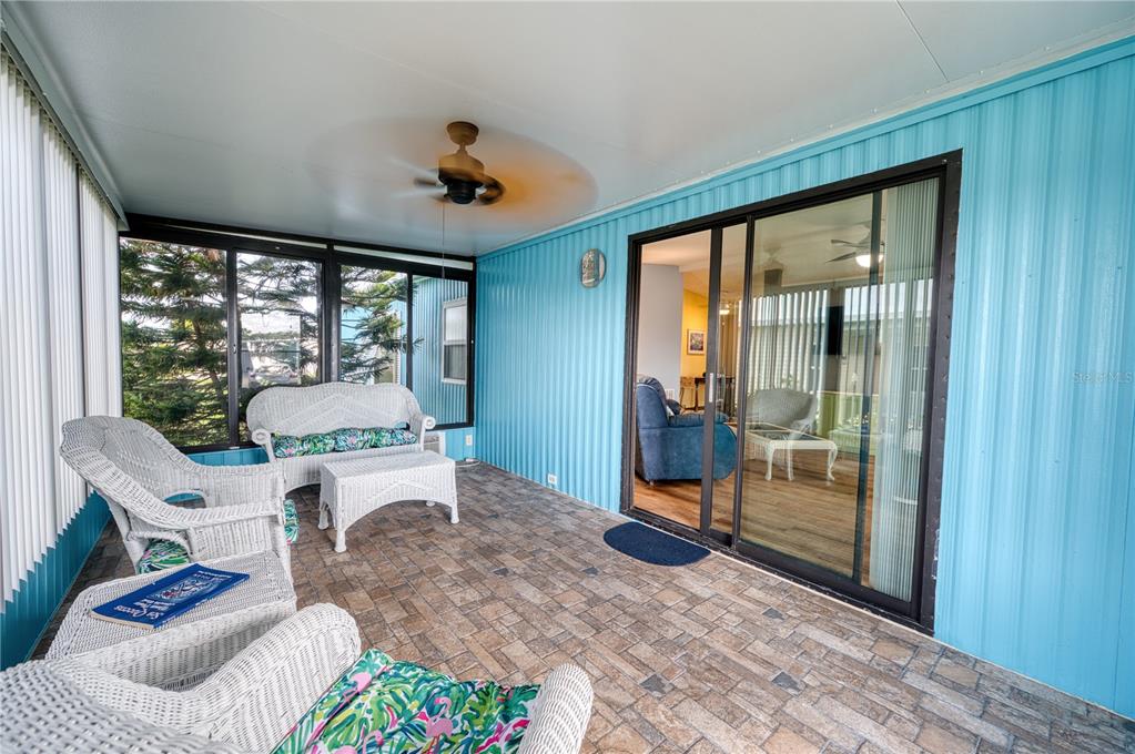 6269 Parakeet Road Englewood, FL 34224 - Photo 10 of 28 a living room with furniture and a large window